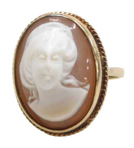A 9ct gold shell cameo dress ring, depicting raised relief figure of a female, in rub over...