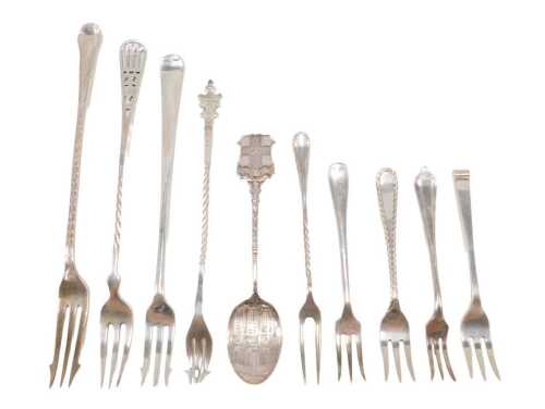 Ten various silver pickle forks and other serving items, to include a three pronged Old English...