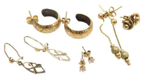 A group of assorted 9ct gold and other earrings, to include rose studs, pair of half hoops, two...