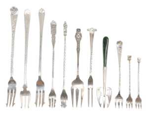 Eleven various silver pickle and serving forks, to include pronged example with entwined stem of...