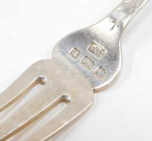 Eleven various silver pickle and serving forks, to include pronged example with entwined stem of... - 2