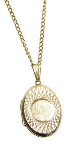 A 9ct gold oval pendant, with a patterned design and pendant loop, 3.3g, on a gold plated curb...