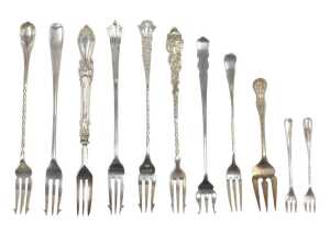 Eleven pickle and other serving forks, to include a small Old English pattern, with entwined...