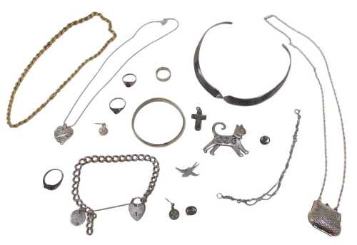 A quantity of silver and other jewellery, comprising a silver charm bracelet, with coin pendant...