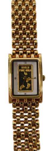 A Brooks and Bentley ingot style wristwatch, in plated and stainless steel mount, boxed.