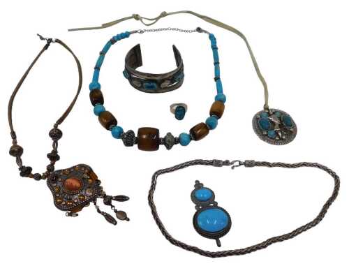 A group of Egyptian scarab and other jewellery, some white metal stamped 800, others unmarked, a...