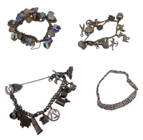 Four silver bracelets, comprising a silver four bar bracelet, 18cm long, a silver and enamel...