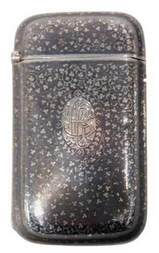 A 19thC Niello cigarette case, of oblong form, with articulated front and top, part cord...