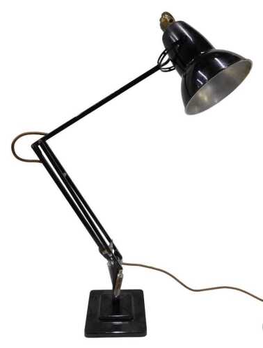 A mid-20thC Anglepoise lamp, with black cone shade, articulated stem and square foot, the shade...