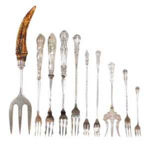 Ten silver and other pickle and serving forks, to include a horn handle example, with silver...