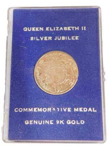 A Queen Elizabeth II Silver Jubilee commemorative medal, 2.5cm diameter, 2.7g, in outer case...