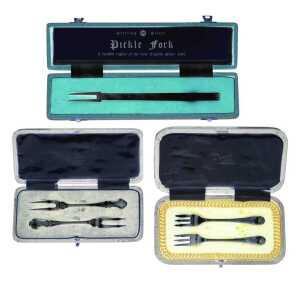 Three various cased sets of pickle forks, to include a pair in Union Street Aberdeen black...