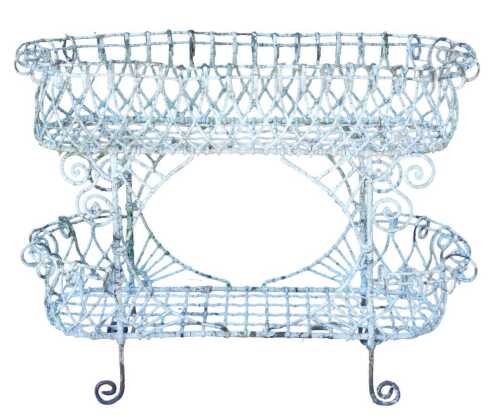 A Victorian wirework planter, of oval form, in two sections, with scroll design, on scroll feet,...