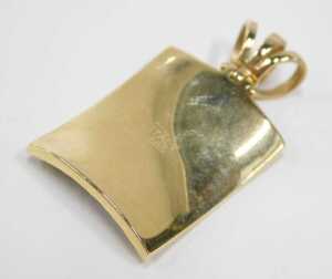 A drop pendant, of shaped rectangular form, tiger stripe, with elaborate three part clasp,... - 2