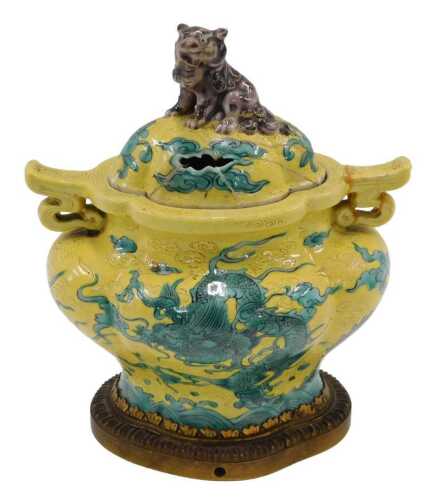 A 19thC Chinese porcelain yellow ground vase, with wild dog knop, painted with dragons in green,...