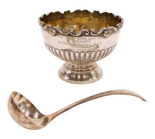 A George V silver bowl, of small proportion, with scroll and shell rim, part gadrooned body on...
