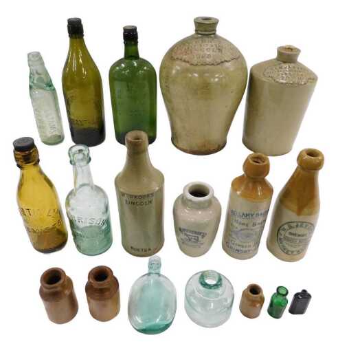 Various bottles, stoneware flagon, with Dawber & Sons Lincoln label, with flared surround, 37cm...