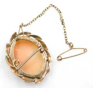 A 9ct gold shell cameo brooch, the figure looking sinister, in a six claw mounted setting, with... - 2