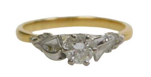 A diamond solitaire dress ring, with round brilliant cut diamond, approximately 0.16ct, in a...