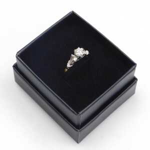 A diamond solitaire dress ring, with round brilliant cut diamond, approximately 0.16ct, in a... - 4
