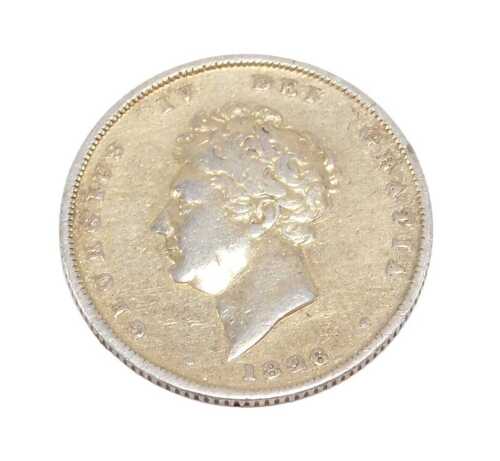 Coin. A George IV shilling 1826, possibly traces of original patina.