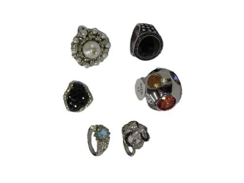 Six dress rings, each stone set, varying from size 17 to 19, each on a white metal coloured band,...
