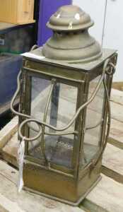 V - An early 20thC brass ship's lantern, of rectangular form, with inverted circular top, four...