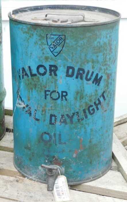 V - An early 20thC Valor Royal Daylight oil drum, of cylindrical form with fixed handle and front...