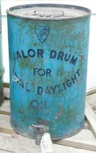 V - An early 20thC Valor Royal Daylight oil drum, of cylindrical form with fixed handle and front...