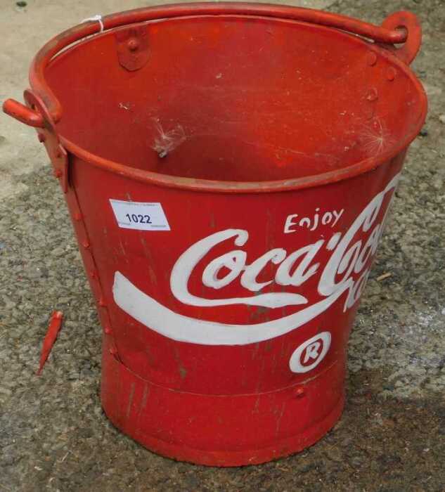 V - A fire-style bucket, painted red, with a Coca-Cola emblem, probably late 20thC. NB. VAT is...
