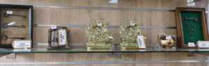 V - Various bygones, collectables, etc., a hanging set of vintage graduated keys, in an oak frame...