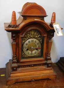 V - A late 19thC walnut and pine cased mantel clock, the circular 11cm diameter Arabic dial with a...
