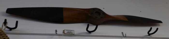 V - A vintage wooden aeroplane propeller, of small proportion, marked Saxon and numbered, 16cm high....