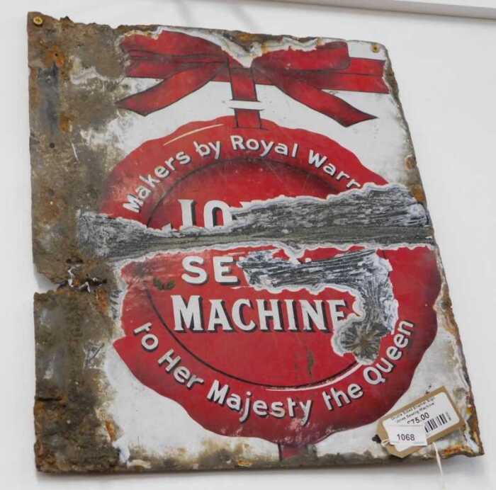 V - An early 20thC double sided Jones Sewing Machines enamel sign, in red and white lettering, 52cm...