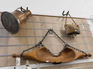 V - Various bygones, a copper and brass Eastern drinking vessel, of bell-shaped form, with fixed...