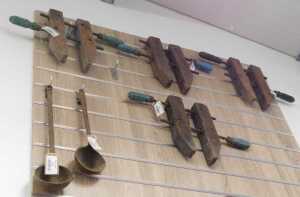 V - Various bygones, collectables, treen, ladles, one with an iron handle, 52cm high, and various...