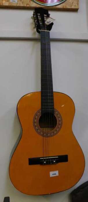 V - A 20thC Chantry six-string acoustic guitar, partially labelled and numbered 2459, 83cm high. NB....