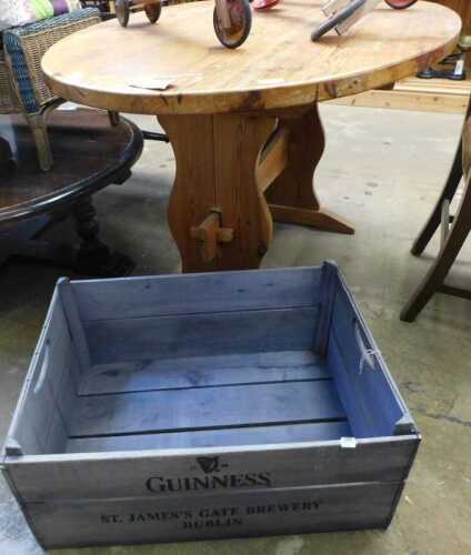 V - A 20thC pine oval dining table, on shaped stiles, 76cm high, 134cm wide, 93cm deep, and a...