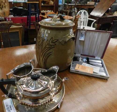 V - Silver-plated ware etc., a three-piece tea service on an associated galleried circular tray,...