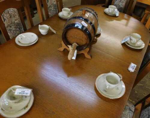V - A 20thC oak coopered table-top spirit barrel, with front tap, of cylindrical form with metal...