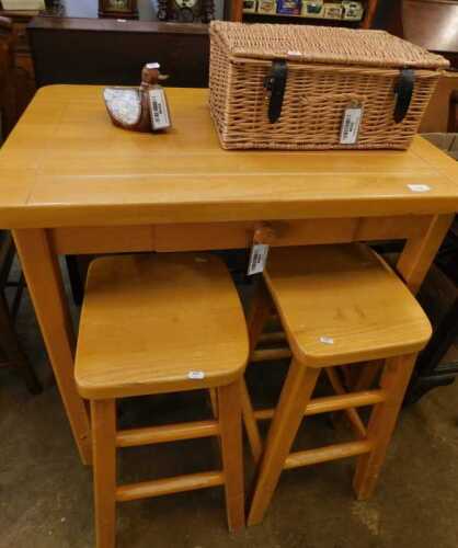 V - A 20thC slatted beech high kitchen table, with frieze drawer, 92cm high, and two stools, a...