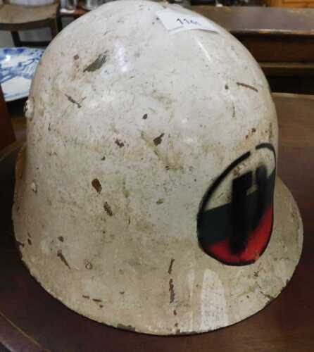 V - A 20thC Bulgarian Military Police metal helmet, white, with white, green and red emblem, part...