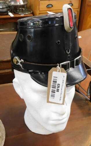 V - A German Police Shako, 3rd quarter of 20thC, 18cm high, with polystyrene head. NB. VAT is...