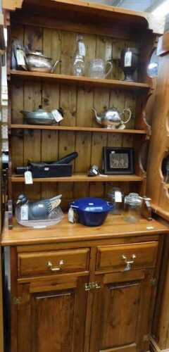 V - A 20thC pine dresser of small proportions, with three Delft racks, raised above two drawers and...