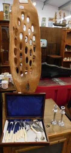 V - A 20thC perforated carved wooden sculpture, on a driftwood-style base, 106cm high, and a small...