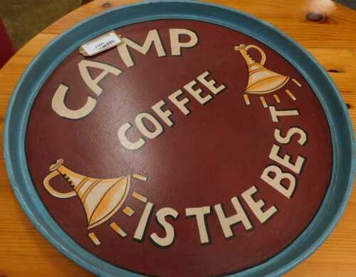 V - A reproduction Camp Coffee is the Best painted metal tray, 55cm diameter. NB. VAT is payable on...