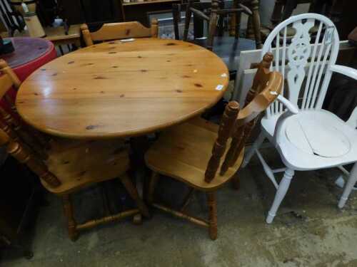 V - Various furniture, a small pine circular kitchen table, on baluster stem terminating in...