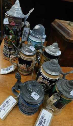 V - Various pottery beer steins, 31cm high, etc. (a quantity) NB. VAT is payable on the hammer price....