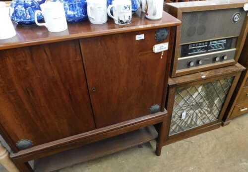 V - Various furniture and effects, a mahogany TV cabinet with metal mounts, the chamfered legs...