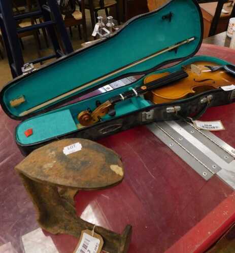 V - A Chinese practice violin, with 29cm wide body and a cast iron shoe last. (2) NB. VAT is payable...